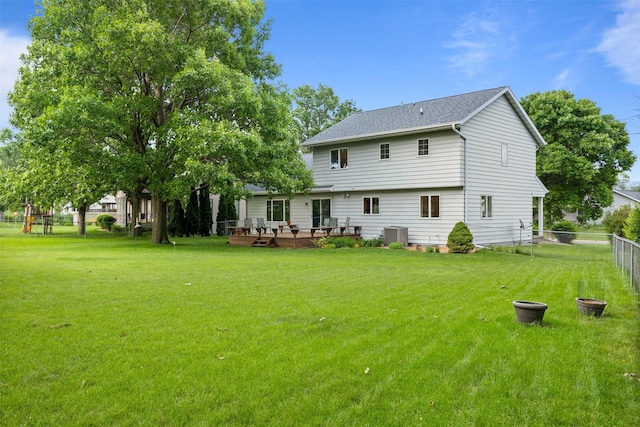 2207 Buchanan Dr, Ames, IA 50010 - back of property with a deck and a shingled roof