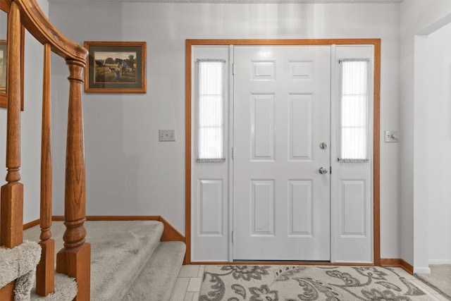 2207 Buchanan Dr, Ames, IA 50010 - foyer entrance featuring plenty of natural light and stairway