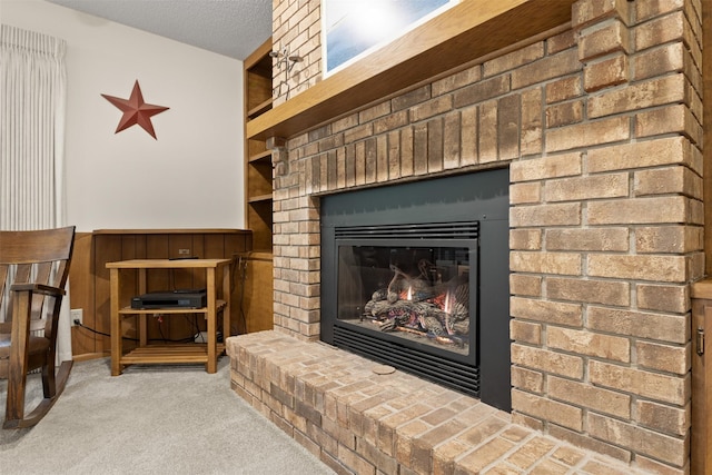 2207 Buchanan Dr, Ames, IA 50010 - detailed view of carpet floors and a brick fireplace