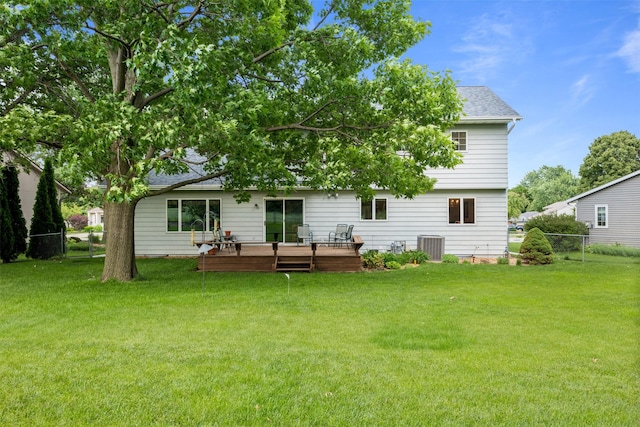 2207 Buchanan Dr, Ames, IA 50010 - back of property with a deck and a shingled roof