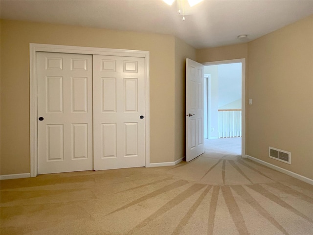 1406 SE Williams Ct, Waukee, IA 50263 - unfurnished bedroom featuring light carpet and a closet