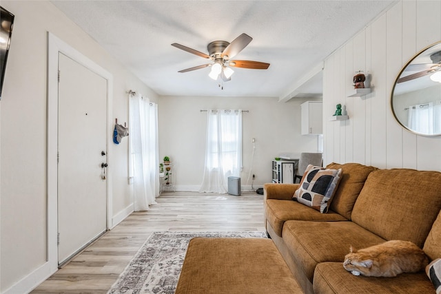 705 Prairie St, Adel, IA 50003 - living area featuring ceiling fan and light wood finished floors