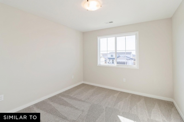 1425 Locust St, Waukee, IA 50263 - empty room with carpet flooring
