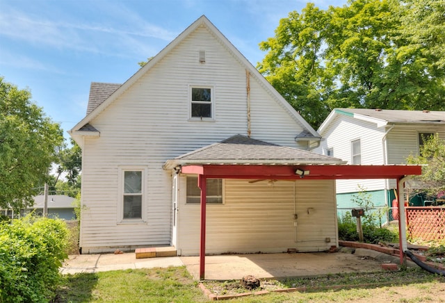 931 Pleasant View Dr, Des Moines, IA 50315 - rear view of property featuring a gazebo, roof with shingles, and a patio