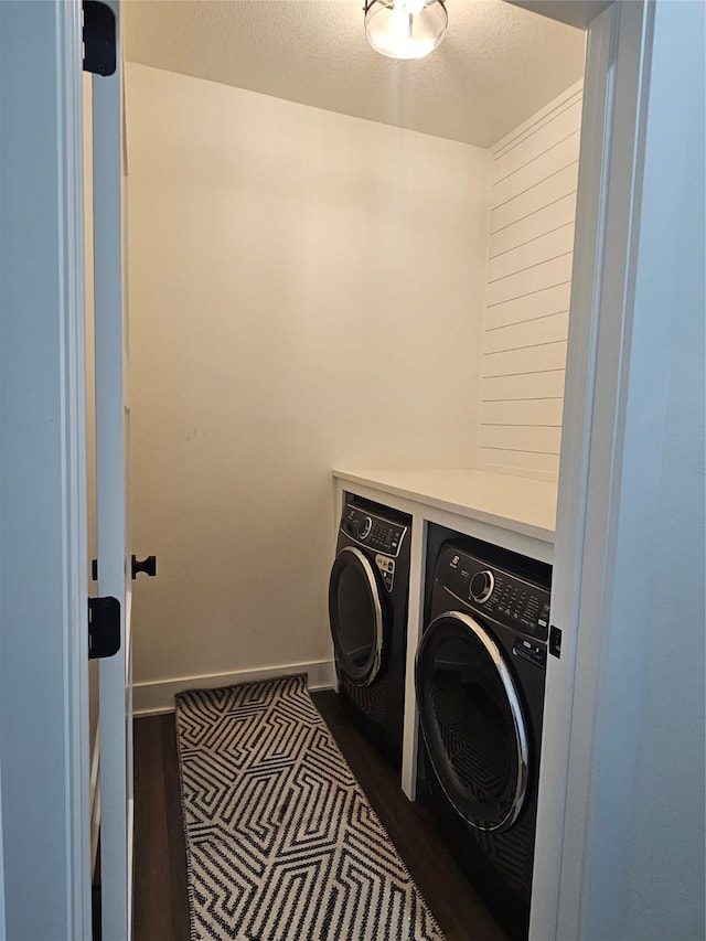 1108 28th St, Perry, IA 50220 - laundry room with separate washer and dryer and dark wood finished floors