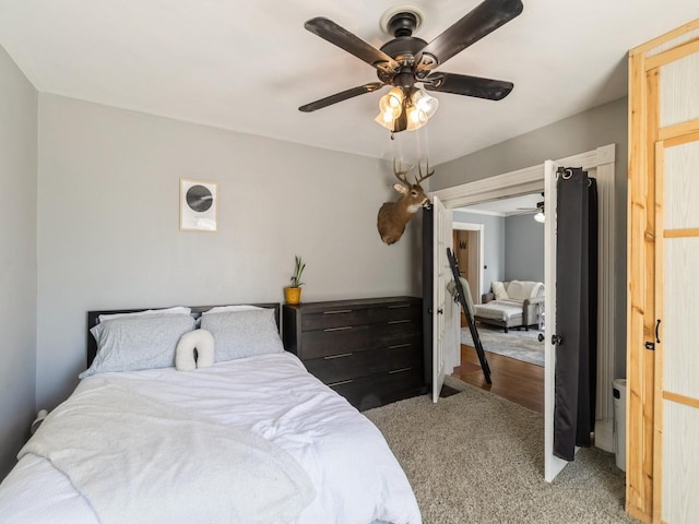 310 Greene St, Boone, IA 50036 - bedroom featuring light colored carpet and a ceiling fan