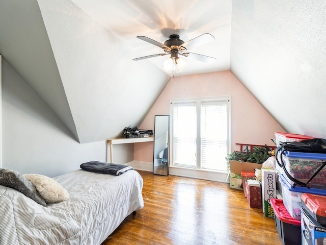 310 Greene St, Boone, IA 50036 - bedroom with wood finished floors, lofted ceiling, and ceiling fan