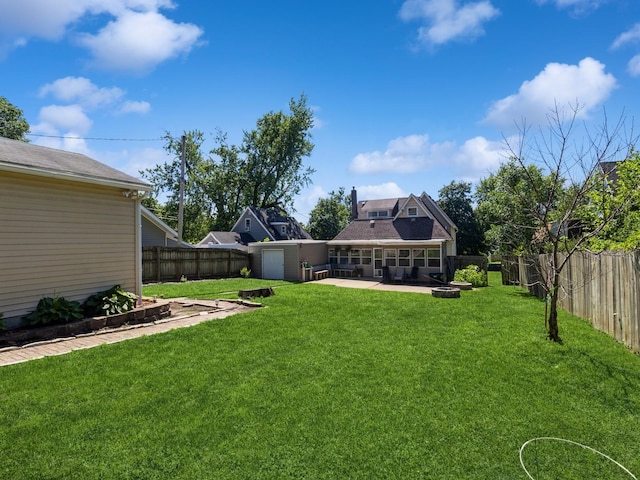 310 Greene St, Boone, IA 50036 - fenced backyard featuring a patio