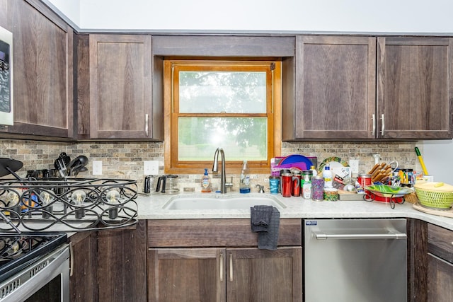 2908 Woodland Ave, West Des Moines, IA 50266 - kitchen featuring dishwasher, dark brown cabinets, tasteful backsplash, and light countertops