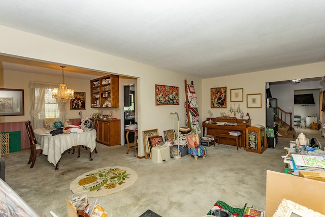 2908 Woodland Ave, West Des Moines, IA 50266 - living area featuring a chandelier, light carpet, and stairs