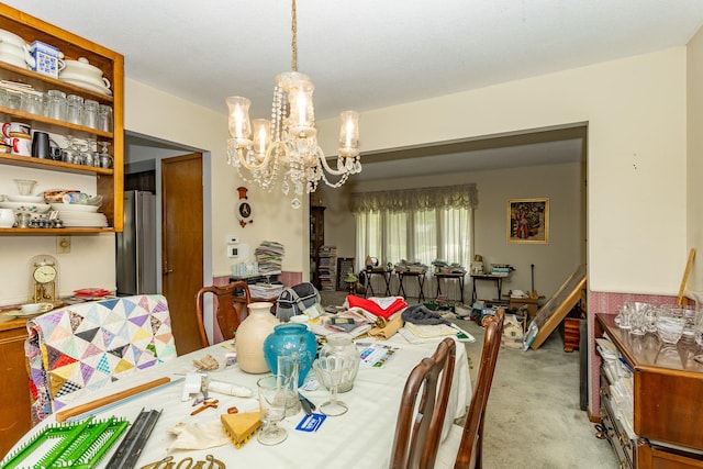 2908 Woodland Ave, West Des Moines, IA 50266 - dining area with a chandelier and light colored carpet