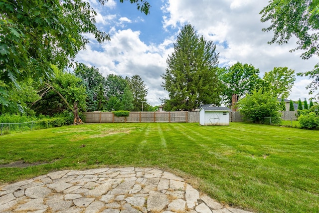 2908 Woodland Ave, West Des Moines, IA 50266 - fenced backyard with a shed and a patio area