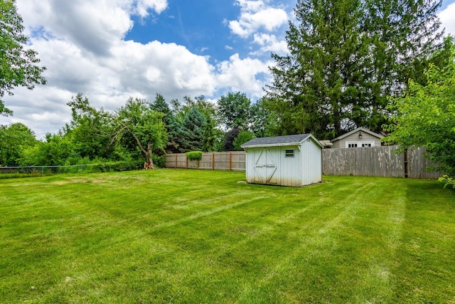2908 Woodland Ave, West Des Moines, IA 50266 - fenced backyard with a shed