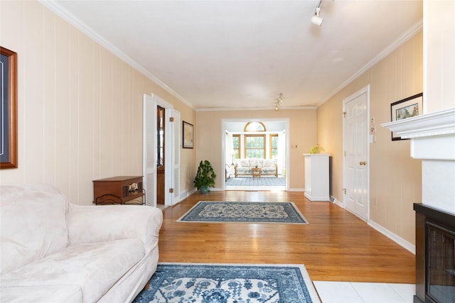 1809 79th St, Windsor Heights, IA 50324 - living area featuring ornamental molding, wood finished floors, and track lighting