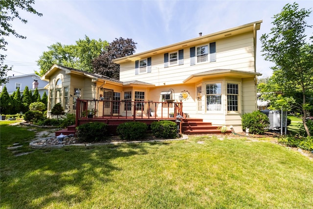 1809 79th St, Windsor Heights, IA 50324 - rear view of property with a wooden deck and a yard