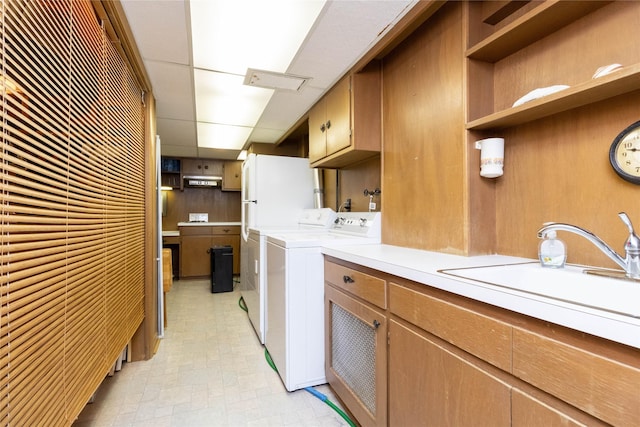 1809 79th St, Windsor Heights, IA 50324 - washroom featuring cabinet space and independent washer and dryer