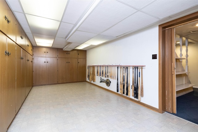 1809 79th St, Windsor Heights, IA 50324 - hallway featuring a paneled ceiling and light floors