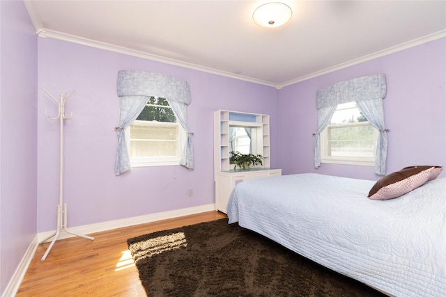 1809 79th St, Windsor Heights, IA 50324 - bedroom with ornamental molding and light wood-type flooring