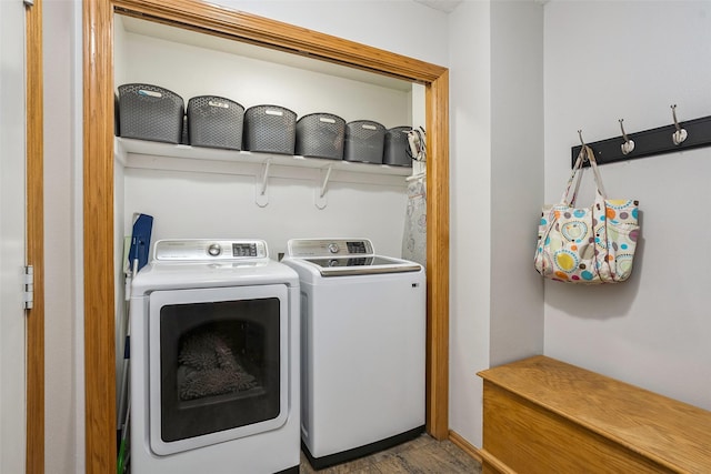 4380 Ashley Park Dr, West Des Moines, IA 50265 - washroom featuring washing machine and clothes dryer and wood finished floors