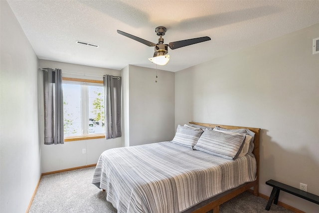 4380 Ashley Park Dr, West Des Moines, IA 50265 - carpeted bedroom featuring a ceiling fan and a textured ceiling