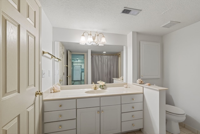 904 54th St, West Des Moines, IA 50266 - bathroom with vanity, a textured ceiling, a chandelier, tile patterned floors, and a shower with shower curtain