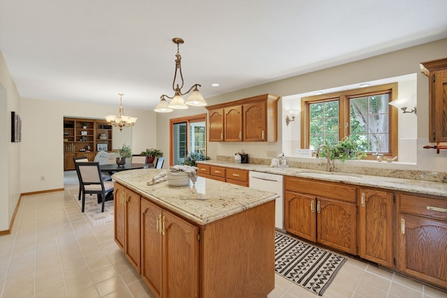 904 54th St, West Des Moines, IA 50266 - kitchen featuring white dishwasher, a center island, healthy amount of natural light, a chandelier, and recessed lighting