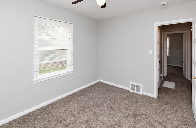 4115 11th St, Des Moines, IA 50313 - unfurnished room with ceiling fan, carpet flooring, plenty of natural light, and a smoke detector