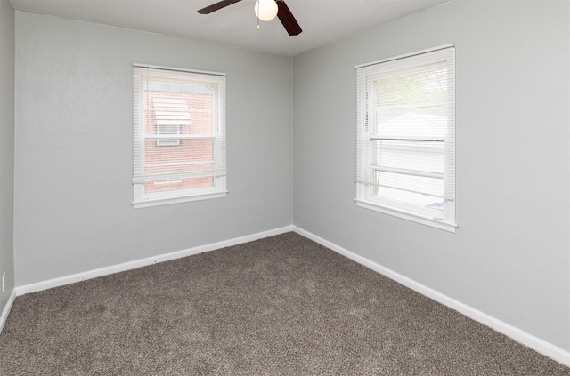 4115 11th St, Des Moines, IA 50313 - unfurnished room featuring dark colored carpet and a ceiling fan