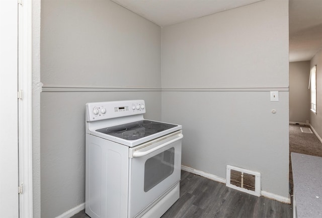 4115 11th St, Des Moines, IA 50313 - kitchen with electric range and dark wood-type flooring