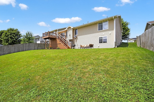 2618 13th St SW, Altoona, IA 50009 - rear view of property with stairs, a fenced backyard, and a wooden deck