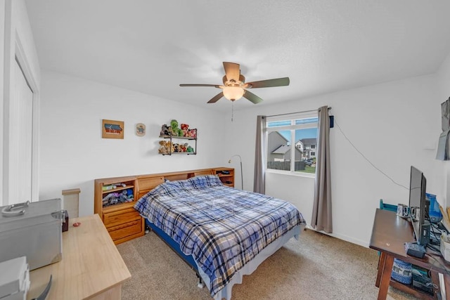 704 36th St SW, Bondurant, IA 50035 - bedroom featuring carpet and a ceiling fan