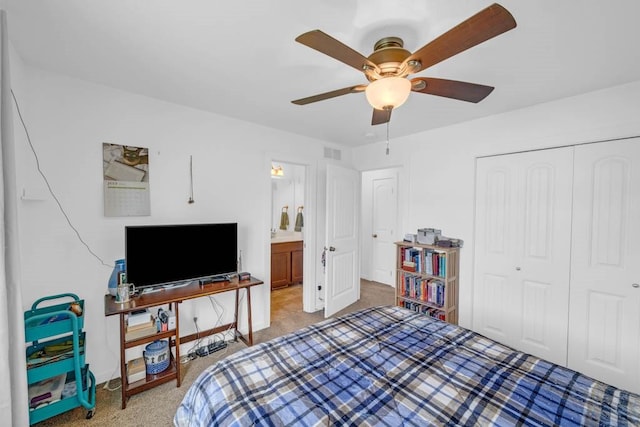 704 36th St SW, Bondurant, IA 50035 - carpeted bedroom featuring a closet and ceiling fan