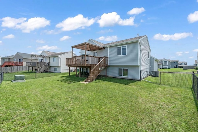 704 36th St SW, Bondurant, IA 50035 - back of property featuring stairway, a residential view, a deck, and a fenced backyard