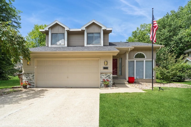 2729 Meadow Point Ct, West Des Moines, IA 50265 - view of front of property featuring a garage, a front lawn, stone siding, driveway, and roof with shingles