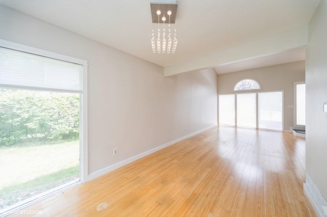 2729 Meadow Point Ct, West Des Moines, IA 50265 - empty room with light wood-style flooring and a baseboard radiator