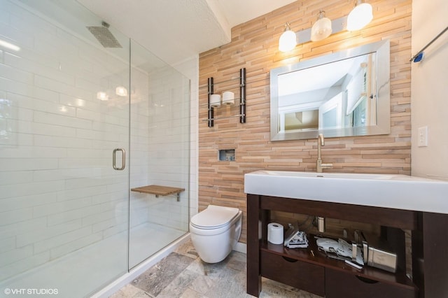 2729 Meadow Point Ct, West Des Moines, IA 50265 - bathroom featuring a stall shower, vanity, and stone finish floors