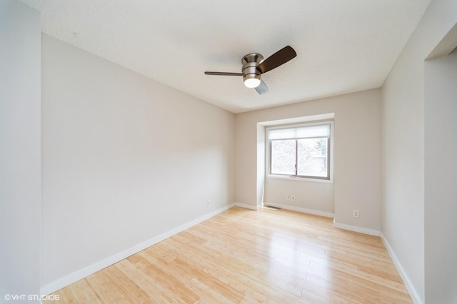 2729 Meadow Point Ct, West Des Moines, IA 50265 - empty room with light wood-style flooring and ceiling fan
