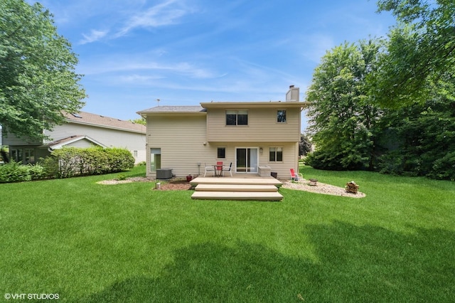 2729 Meadow Point Ct, West Des Moines, IA 50265 - back of house with a wooden deck, a chimney, and a yard