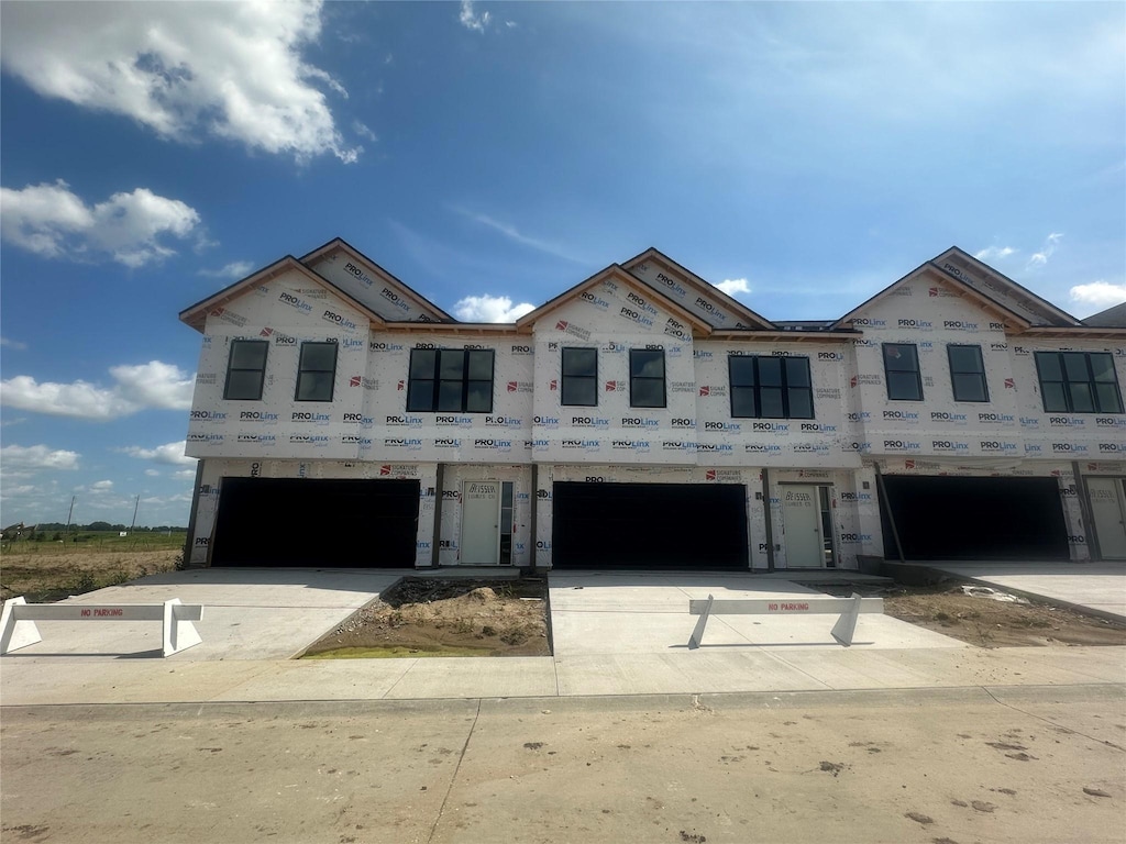 1376 Meadow Rose Pl, Waukee, IA 50263 - unfinished property with an attached garage and concrete driveway