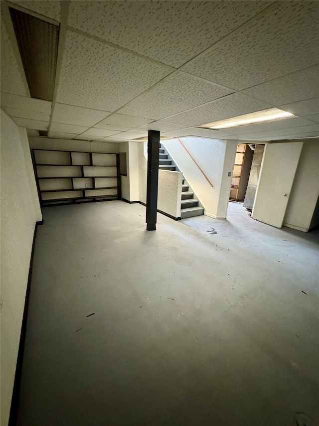 2611 E 38th St, Des Moines, IA 50317 - finished basement featuring stairs and a drop ceiling