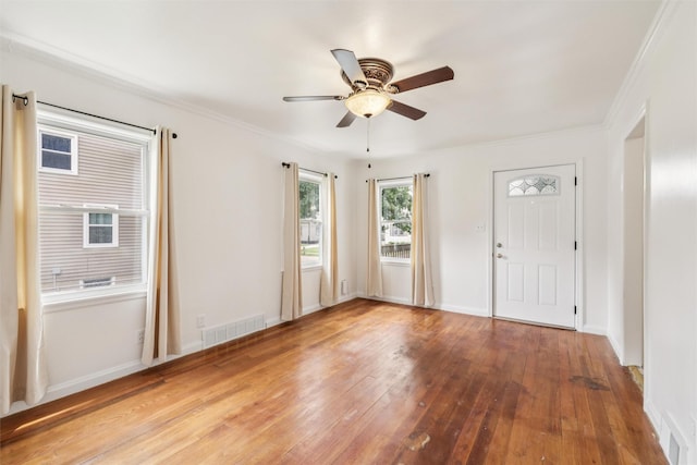 305 Hillside Ave, West Des Moines, IA 50265 - entrance foyer with ceiling fan, hardwood / wood-style floors, and ornamental molding