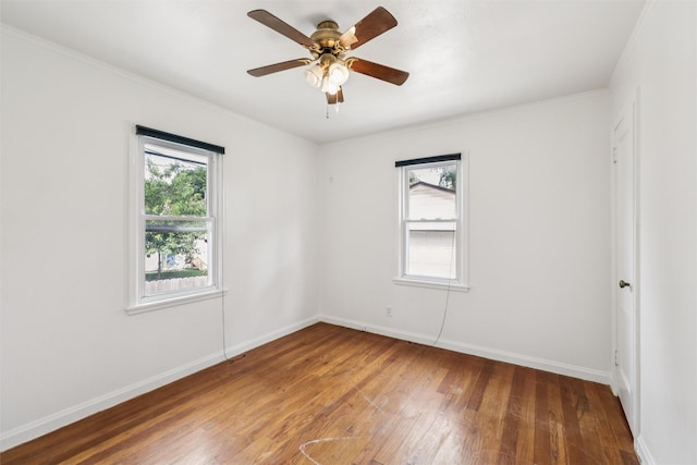 305 Hillside Ave, West Des Moines, IA 50265 - empty room featuring hardwood / wood-style floors, a ceiling fan, and ornamental molding