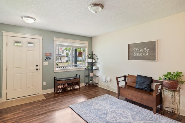 4034 6th Ave, Des Moines, IA 50313 - entrance foyer with wood finished floors and a textured ceiling