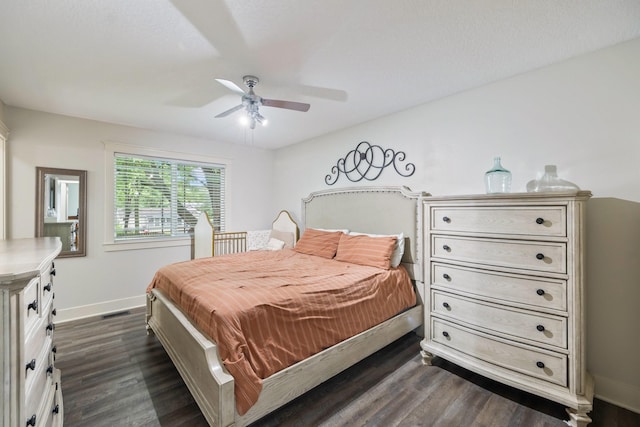 4034 6th Ave, Des Moines, IA 50313 - bedroom with dark wood-type flooring and ceiling fan