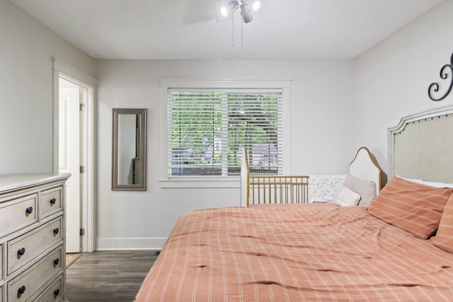 4034 6th Ave, Des Moines, IA 50313 - bedroom with dark wood-style flooring and ceiling fan