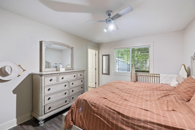 4034 6th Ave, Des Moines, IA 50313 - bedroom with dark wood-style floors and a ceiling fan