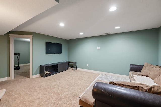4034 6th Ave, Des Moines, IA 50313 - living room featuring carpet floors and recessed lighting