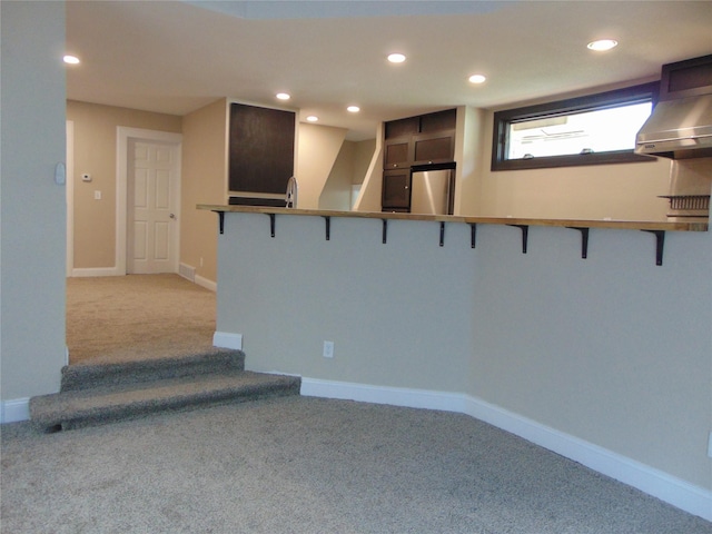 2340 Des Moines St, Des Moines, IA 50317 - spare room featuring light carpet and recessed lighting