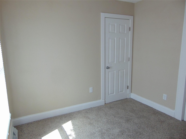 2340 Des Moines St, Des Moines, IA 50317 - carpeted spare room featuring baseboards