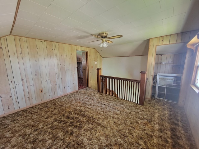 108 W Logan St, Casey, IA 50048 - bonus room with vaulted ceiling, wood walls, carpet, and ceiling fan